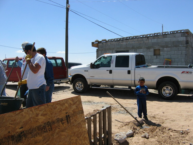 Image 14 of 168
a cinder-block building next to our worksite, and some owasso people at an adjacent site
