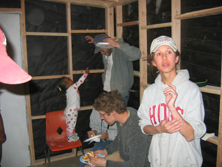 Image 137 of 168
joey plays with genesis, jen serves food